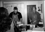 Brian Walter, left, and Steve Menke serve food during the Knights
of Columbus Council 1372 breakfast at St. John the Evangelist
Catholic Church. The March 13 event raised money for scholarships.
The Knights present two $500 scholarships each year. One goes to a
graduating high school senior who is Catholic. The other goes to a
Knight or family member.