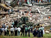 Rescue workers try to retrieve several hundred workers who were
trapped after a nine-story building collapsed following a boiler
explosion Monday morning west of Dhaka, Bangladesh.