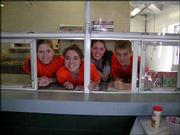 Douglas County 4-H'ers work in the Lawrence Flower Lawn &
Garden Show's concession stand to raise money for their trip to
Washington, D.C. These youths will spend seven days in Washington,
D.C., learning about government and seeing historic sites. From
left are Alison Mesler, Alyssa Golden, Mary Cox and Kaleb Horne.