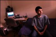 Kansas University senior Arsen Kharatyan won a legal battle with
his previous landlord for withholding security deposit money
without giving a written reason. Kharatyan was pictured on
Wednesday at his new apartment on Kentucky Street.