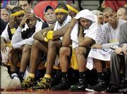 Indiana Pacers, from left, Stephen Jackson, Anthony Johnson,
Jermaine O'Neal, Jamaal Tinsley and Reggie Miller watch from the
bench during the closing minutes of their 96-81 loss to the
Pistons. The Pacers fell Monday in Auburn Hills, Mich.