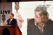 Philadelphia Mayor John Street speaks via satellite to Bob Geldof during a press conference where it was announced that Philadelphia would be one of five locations around the world to play host to a Live 8 concert.