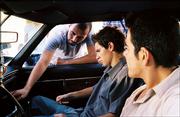 Alonso Mayo, left, directs actors Jeff Licon and Jose Yenque in a scene from his film "Wednesday Afternoon." Mayo - a former Lawrence resident - earned a 2005 Student Academy Award in the narrative category.