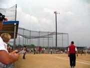 Clouds built up during the first game of a 16-U Phenix-Fyler doubleheader on June 8 at Mid-America West in Shawnee. The second game was rained out in the second inning.