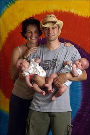 Chris Polonchek, 28, his wife, Maria, 25, and their 3-month-old twin boys, Taj and Luke, all of Lawrence. "We&squot;re only 15 minutes from home if there&squot;s a meltdown (with the boys)," Chris said.