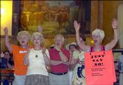 Republicans, from left, Charlene Bredemeier, Charlotte O'Hara, Wally Bredemeier and Mary Frey show support during a rally Saturday criticizing the state Supreme Court's involvement in the school finance bill during a rally at the Kansas Statehouse in Topeka.