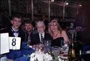 The family of incoming Kansas University freshman Mmicah Downs has been reflecting upon Micah's childhood. Downs, who Friday moved to Lawrence, is shown above at left with, from left, father Steve, legendary UCLA coach John Wooden, and mother Gerri at the McDonald's All-American game in April in South Bend, Ind.