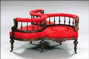 The auctioneer called this a "Renaissance Revival confidante" at a recent sale at New Orleans Auction Galleries. The three-section seat sold for $2,760.