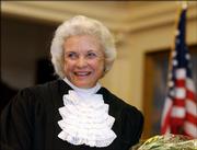 U.S. Supreme Court Justice Sandra Day O'Connor is shown before administering the oath of office to members of the Texas Supreme Court on Jan. 6, 2003, in Austin, Texas. O'Connor, the first woman on the Supreme Court and a swing vote on abortion, as well as other contentious issues, announced her retirement Friday.