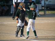 Nathan Peterson, left, talks with pitcher Nathan Herries between innings of an 8-U Douglas County Amateur Baseball Assn. game against the Jets on June 27 at Douglas County 4-H Fairgrounds.
