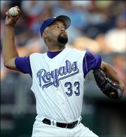 Kansas City starting pitcher Jose Lima pitches to Minnesota's Shannon Stewart. Lima earned just his second victory of the season, and the Royals won, 8-5, Thursday in Kansas City, Mo.