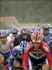 Armstrong, of Austin, Texas, center, rides in the pack during Thursday's stage between Troyes and Nancy in eastern France.