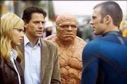 Sue (Jessica Alba), left, Reed (Ioan Gruffudd), Ben (Michael Chiklis) and Johnny (Chris Evans) react to their newfound powers in "The Fantastic Four."