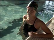 Lawrence Aquahawk Emma Reaney, 12, won two events at the Roger Hill Invitational. She prevailed in the 50-meter freestyle and 200 individual medley at the annual swim meet Friday at the Lawrence Indoor Aquatic Center.