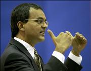 Alok Ahuja, an attorney representing the state, delivers oral arguments during a hearing on school finance Friday in Topeka.