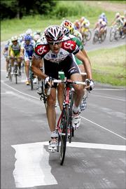 Jens Voigt, of Germany, leads the chase as he rides up the Feignes pass during the ninth stage of the Tour de France. Mickael Rasmussen of Denmark won the stage Sunday, but Voigt took the overall lead from Lance Armstrong.