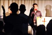 The primarily gay male congregation at the Free Community Church gathers during a June 19 service in Singapore. Though in practice homosexuality is often tolerated, gay sex is illegal in Singapore, and gay groups are unable to register as legitimate organizations.