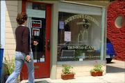 A customer walks into Downtown Catering & Carry-out, 518 E. Eight St., during lunch hour on a recent weekday. Owner Dorothy Malsbury has regular customers who come in for daily specials, as well as a catering business that keeps her busy.