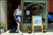 Downtown Catering & Carry-Out is a popular lunchtime stop for downtown employees and others in search of a speedy, high-quality meal. Owner Dorothy Malsbury is photographed outside the business, 734 Vt.