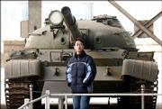 A Chinese man walks in front of a Soviet-made tank on display at the military museum in this Jan. 21 file photo in Beijing. The U.S. government says Chinese military planners are looking to expand power in the Asia-Pacific beyond their immediate goal of dominating rival Taiwan, but China's foreign minister insisted Wednesday that his country is no danger to others. Beijing is modernizing its arsenal with the addition of fighter jets, submarines, missiles and other high-tech weapons - many of them bought from Russia.