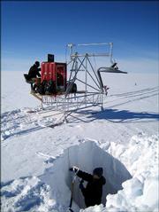 Kirby Mullenberg, a Kansas University undergraduate student, digs in a snow pit as Tim Rink, a graduate student, tests radar in Greenland. Mullenberg and Rink are among a team of KU researchers testing methods to measure the properties of snow to get a better idea fof how to predict polar ice sheet melting.
