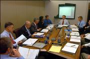 Participants of the Kansas Bioscience Authority meeting were, from left, Stephen O'Connor, board member; David Franz, board member; Dan Glickman, board member; Bill Sanford, board member; Sandra Lawrence, board member; Dan Schmisseur, vice president of the Kansas Technology Enterprise Corp.; Clay Blair, board chairman; and Tracy Taylor, president of KTEC. The board met July 11 at the Dole Institute of Politics.