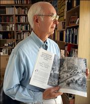 Former Kansas Supreme Court Justice Fred Six holds a copy of Kansas History magazine in which Six edited letters and reports from the 1863 raid of Lawrence by William Quantrill.