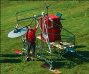 Timothy Rink, a research student in the Radar Systems and Remote Sensing Laboratory in Nichols Hall, works with a planwave radar sled constructed by lab members. The device will be sent to Greenland as part of a $19 million grant from the National Science Foundation to conduct polar research.