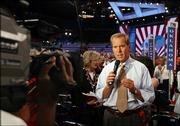 Peter Jennings does a report from the floor during the first day of the Republican National Convention in this Aug. 30, 2004, file photo from New York. Jennings died Sunday, just days after his 67th birthday on July 29.