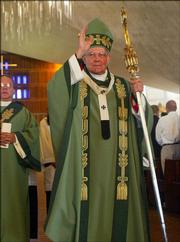 Archbishop William Levada of the Roman Catholic Archdiocese of San Francisco exits St. Mary's Cathedral after giving his final Mass on Sunday in San Francisco. Levada is leaving to assume his new post as the highest appointed American official in the Vatican.