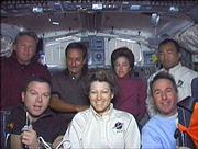 The crew, back row from left, are astronaut Andy Thomas, astronaut Charles Camarda, astronaut Wendy Lawrence and Japanese astronaut Soichi Noguchi, and front row from left, pilot James Kelly, commander Eileen Collins and astronaut Steve Robinson.