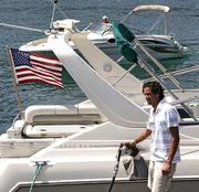 Chris Elbrecht, of Mint Detail, a yacht management service, puts about $200 worth of regular gasoline in a boat at Belmont Harbor in Chicago. Elbrecht paid $3.58 a gallon for the fuel. Analysts say that despite a surge in gasoline prices demand has not fallen significantly. High energy prices are expected to drive up heating costs this winter.