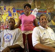 The Chalmers family, from left, freshman guard Mario, mother Almarie and new Kansas University director of basketball operations Ronnie, is a new addition to Jayhawk athletics. The family recently relocated to Lawrence from Anchorage, Alaska.