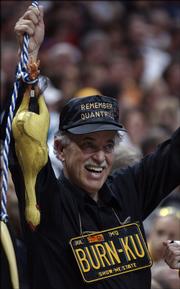 Tom Mendenhall, of Columbia, Mo., cheers on MU at a recent Kansas University basketball game. While William Quantrill is reviled in Lawrence, he is hailed as a folk hero in many parts of Missouri.
