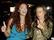 Actress Sofia Milos, left, laughs with Latin Grammy nominee singer Fey on Tuesday after a news conference at the Henry Fonda Music Box theatre in Los Angeles. The sixth annual Latin Grammy awards will be broadcast live from the Shrine auditorium in Los Angeles on November 3.