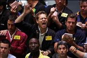 Traders work in the natural gas futures pit at the New York Mercantile Exchange. Crude oil, petroleum products and natural gas futures prices soared Monday on the New York Mercantile Exchange, as Hurricane Katrina whipped through the key oil producing and oil refining region of the Gulf of Mexico.