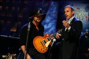 NBC News' Matt Lauer, host of the celebrity telethon for Hurricane Katrina disaster relief, introduces Tim McGraw during the telethon. Some 18 presenters performed musical numbers or gave information on the tragedy's huge scope.