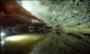 The Lost Sea is illuminated by underwater lights that cast a glow on the rock walls surrounding the lake. The lake, discovered in 1905, is a pool of water about 300 feet below the entrance to a cave. It averages 150,000 visitors a year.