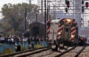 A Metra commuter train sits off the tracks after derailing Saturday in Chicago. At least two people were killed and at least 80 were injured in the derailment on Chicago's South Side, officials said.