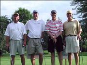 From left, Don McNeely, Kansas University coach Bill Self, Pat Bello and Miles Schnaer participate in the Cottonwood Classic golf tournament Aug. 19 at Alvamar Country Club. The team took second place in the championship flight. Schnaer was a tournament sponsor.