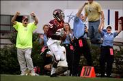 Virginia Tech's D.J. Parker runs for a 78-yard TD after a blocked field goal against Georgia Tech. The Hokies won, 51-7, Saturday in Blacksburg, Va.