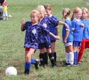 Allie Knapp gets ready to kick the ball during warm-ups before the start of her team's game with the Soccer Girls on Saturday at Youth Sports Inc.