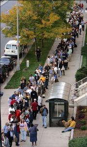 People filing for bankruptcy protection line up outside the U.S. Bankruptcy Court in downtown Denver. People were filing bankruptcy petitions Friday to beat the start of a new federal law that sets stricter standards for seeking protection from creditors.