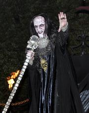 James Keaton performs in his role as Eel Mouth at Universal Orlando's Halloween Horror Nights in Orlando, Fla. The nation's $11 billion amusement industry has appropriated the holiday as its own, helping transform Halloween into a monthlong celebration.