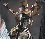 Nona Lee Davis performs in her role as the Terra Queen at Universal Orlando's Halloween Horror Nights in Orlando, Fla. Blood, gore and a whole lot more are in store for visitors to amusement parks that celebrate Halloween the entire month of October.