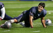 New England linebacker Tedy Bruschi works out with the Patriots for the first time this season. Bruschi practiced Wednesday in Foxborough, Mass.