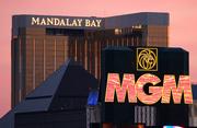 Mandalay Bay, the Luxor pyramid and an MGM marquee are seen at sunset in Las Vegas. Both the Mandalay Bay and MGM Grand hotels are good for families, with attractions enjoyed by children.