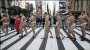Sumo wrestlers, dressed in traditional mawashia, walk to a weigh-in before the World S.U.M.O. Challenge - Battle of the Giants at Madision Square Garden. The athletes, shown Oct. 22 in New York, are hoping to increase sumo wrestling's popularity in the U.S.