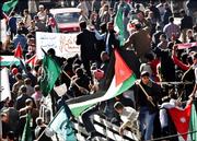 Thousands of Jordanians march during an anti-terrorism rally following Friday prayers in Amman, Jordan.