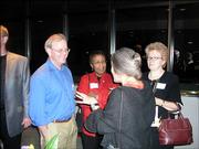 From left, Stephen Fawcett, Sandra Gautt and Kathleen McCluskey-Fawcett visit with Saralyn Reece Hardy, with back to camera, at the Kansas University School of Fine Arts' sixth annual Collage fundraising reception. The fundraiser was Sept. 16 at the Lied Center.